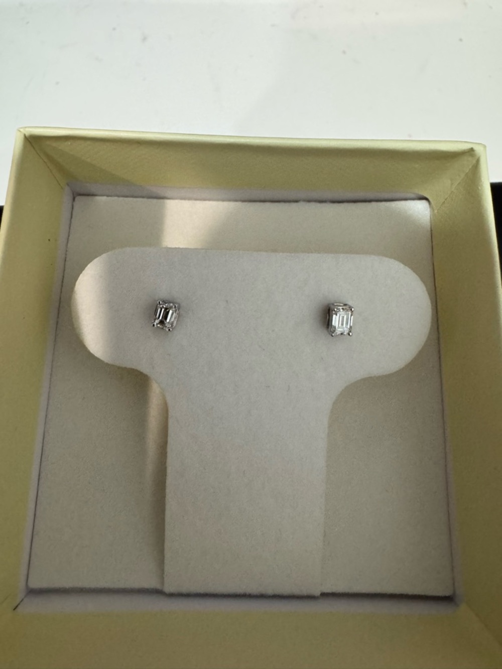 Classic diamond emerald cut earrings set in 14k white gold